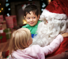 Take some special photos with Santa on Long Island this Christmas. Photo via Canva