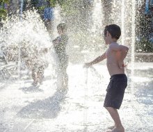 Head to City Springs City Green for a romp through the refreshing splash pad. Photo courtesy of City Greene