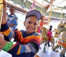 Celebrate at the Prospect Park Carousel with two hours of unlimited rides and a shady spot for a birthday picnic. Photo by Paul Martinka