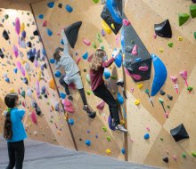 VITAL Climbing Gym offers youth classes, camps, competitive teams, and plenty of birthday party options, too. Photo by Julia Jin Wolfson