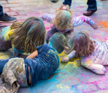 The South Street Seaport celebrates Holi with colorful puppets, dances, drummers, delicious food, and powder play. Photo by Mike Szpot