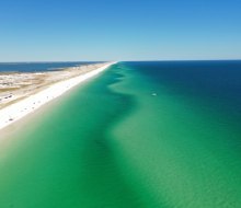 Miles upon miles of endless gorgeous beach and stunning emerald water; that's Pensacola Beach!
