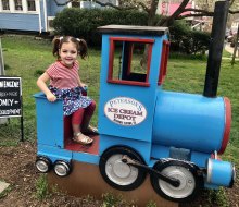 Kids love to sit in the train engine at Peterson's Ice Cream Depot in Clifton, Virginia. Photo courtesy of Jennifer Marino Walters