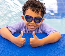 Two thumbs up for water safety! Photo courtesy of SafeSplash Swim School