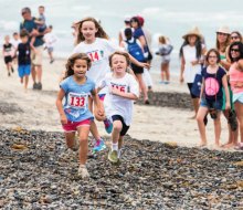 Celebrate the sea with a fun Dolphin Dash. Photo by Steve Taylor courtesy of the San Clemente Ocean Festival