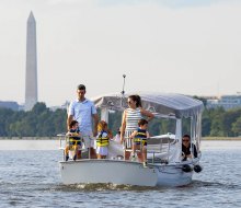 Rent an easy-to-drive electric boat for a scenic and cool family outing. Photo courtesy of SeaDC at dceboats.com