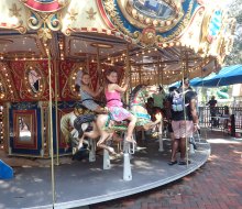 Riding the carousel at Sugar Sand Park, photo by the author