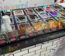 An epic toppings bar allows for an endless combination of sugar-filled treats at Sundae Donuts, Huntington's newest sweet shop. 