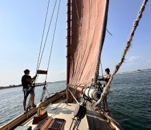 Take in the gorgeous views as you learn to hoist the sails. 