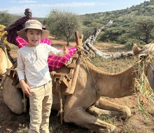 Embrace the slow rhythm of a camel ride on a safari adventure. Photo by Diana Kim