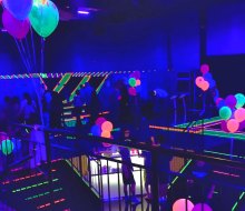 Throw a birthday party with glow-in-the-dark trampoline time at Bounce! in  Valley Cottage. Photo courtesy of the venue