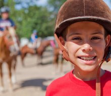 Horseback riding is a favorite kid activity in Conroe