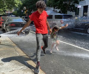 Free things to do in NYC this summer: Hit up the local fire hydrant for one of our favorite free summer activities in NYC