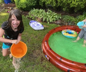 A kiddie pool and some buckets equal tons of backyard fun! Photo by Rose Gordon Sala 