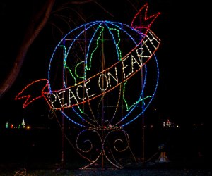 Image of a Peace on Earth Christmas light display in New England