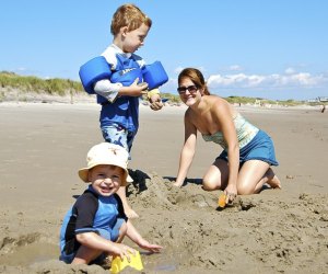 Photo of family on the beach - Things to do in Narragansett with Kids.