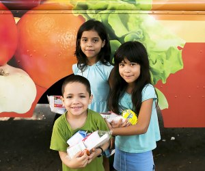 Free breakfast and lunch is available in parks, schools, and sometimes by food truck for kids across the country. Photo courtesy of Share Our Strength