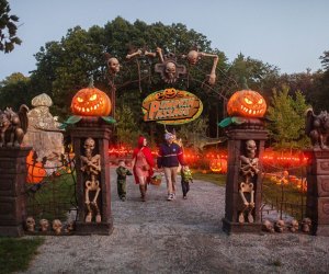 Image of a family at Nature Art Village's Pumpkin Passage.