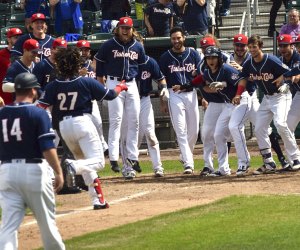 this image shows New Hampshire Fisher Cat baseball players.