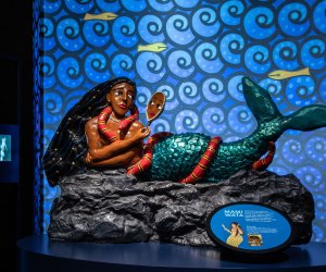 A Parent's Review: Mythic Creatures at the Academy of Natural Sciences Mami Wata heals the sick and brings good luck to her followers, but she also has a temper and will drown people who don’t obey her. Photo credit AMNH