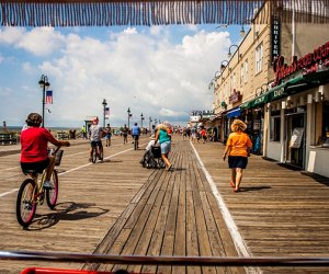 Ride a bike along the ocean on the Ocean City Boardwalk