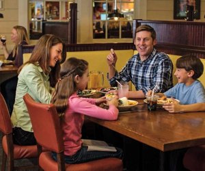 Image of family at a restaurant - Kids Eat Free