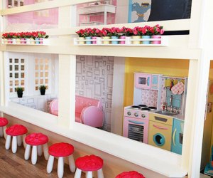a dollhouse and play space at a Latte Fun Play Spaces on Long Island Open Now