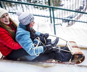 Open only in the winter, Lake Placid’s Toboggan Chute is a 30-foot high structure that sends toboggans down an ice-covered chute onto the frozen Mirror Lake. Photo courtesy of Lake Placid, Adirondacks, USA