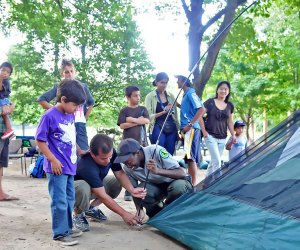 Urban Park Rangers bring tents (and set them up, too!) for family camping nights in NYC parks.