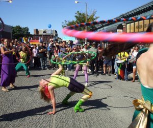 Gawk at the street performers at the Allston Village Street Fair. Photo courtesy of Allston Village
