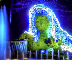 Dazzling Holiday Lights Drive-Thrus and Christmas Light Shows in Atlanta Garden Lights, Holiday Nights at Atlanta Botanical Garden transforms the iconic ‘Earth Goddess’ into the ‘Ice Goddess.' Photo courtesy of the ABG