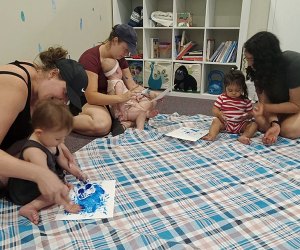 Tots and their parents can get creative in parent-and-me art classes at Waddle N Swaddle. Photo courtesy of Waddle N Swaddle