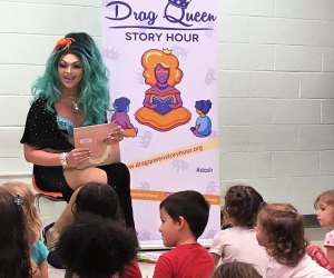 Mermaid Queen Bella Noche reads at the library. Photo courtesy of Drag Queen Story Hour
