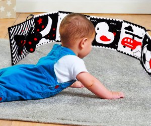 Black-and-white toys and books, like this Thremhoo foldout book, are the perfect first tummy-time playthings. 