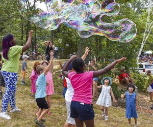 Image of children playing with bubbles - end of summer bucket list