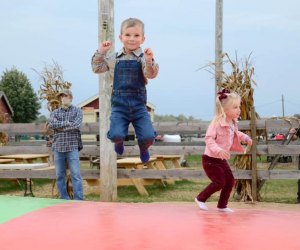 kids jumping on  a trampoline