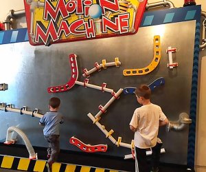 kids play on a motion machine musuem