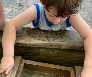 child mining for a gemstone