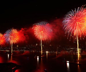 Five barges line the East River for Macy's 4th of July fireworks show in NYC