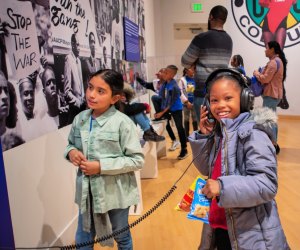 Kids check out the current exhibit at the CAAM. Photo by HRDWRKER
