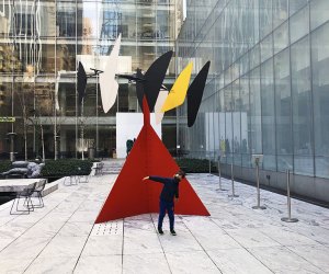 Little boy poses in front of Calder sculpture at MoMA