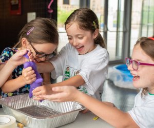 Collaborative problem solving is a hallmark of Camp Invention. Photo courtesy of Camp Invention