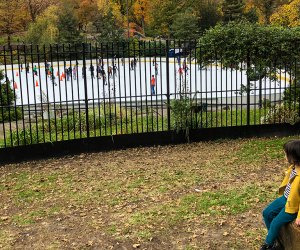 Little girl overlooking Wollman Rink in Central Park