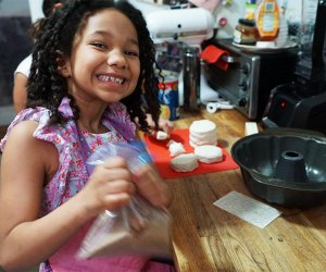 Put kids to work in the kitchen baking  family-favroite treats! Photo by Jody Mercier