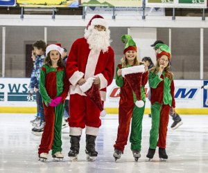 Holiday Village Stroll Santa and elves ice skating