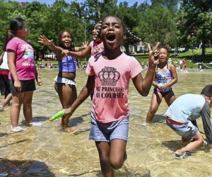 Image of children at a spray park - end of summer bucket list.