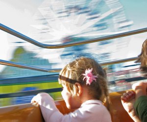 kids on an amusement park ride