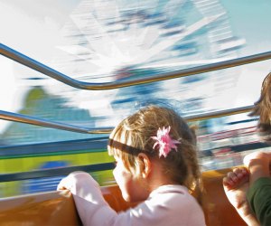 Kids on a Coney Island amusement park ride