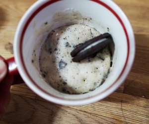 Cookies and Cream Mug Cake topped with an Oreo