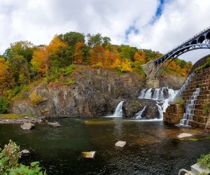 The walkway over Croton Dam framed by fall foliage